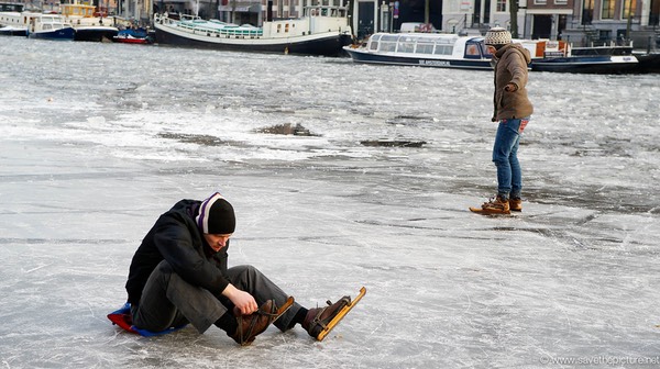Amsterdam frozen canals, old style skates