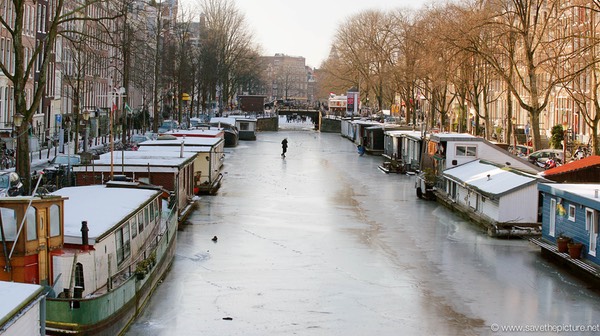 Amsterdam frozen canals, houseboats
