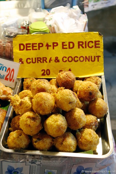 Deepfried rice balls, curry and coconut