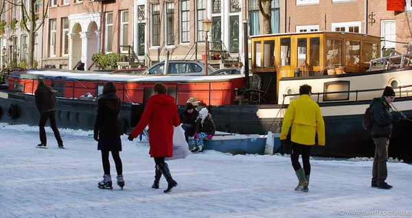 Amsterdam frozen canals, houseboat