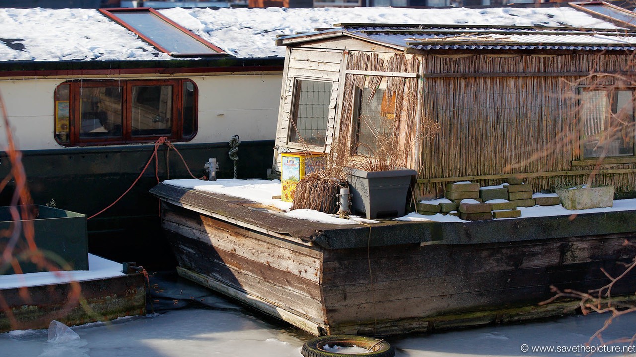 Amsterdam frozen canals, houseboat