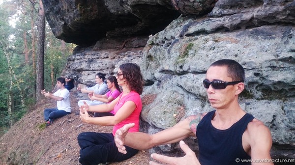 Early morning zen meditation at the edge of the cliff